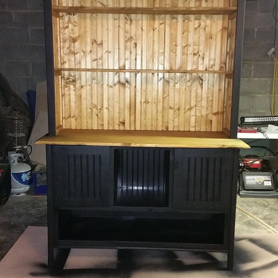 Custom-built rustic hutch with beadboard back and open shelving